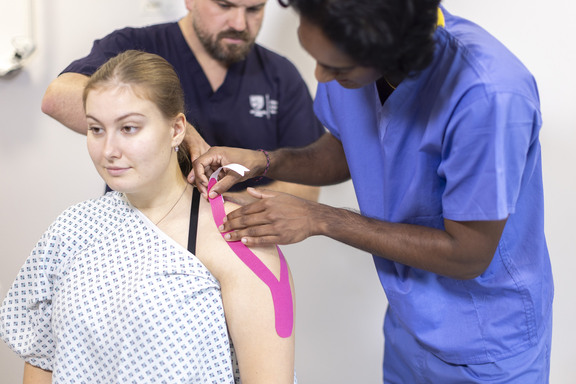 Patient with sports placement chiro student