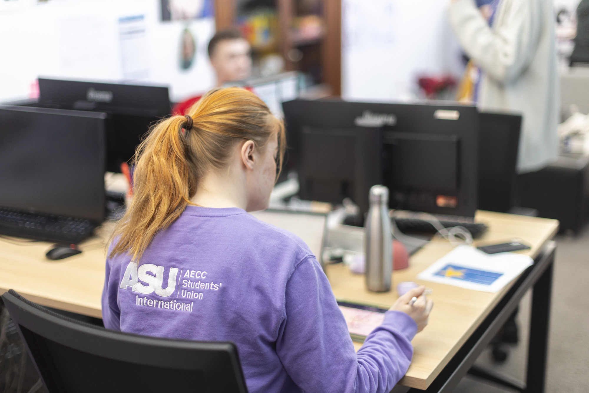 ASU Student working at a desk