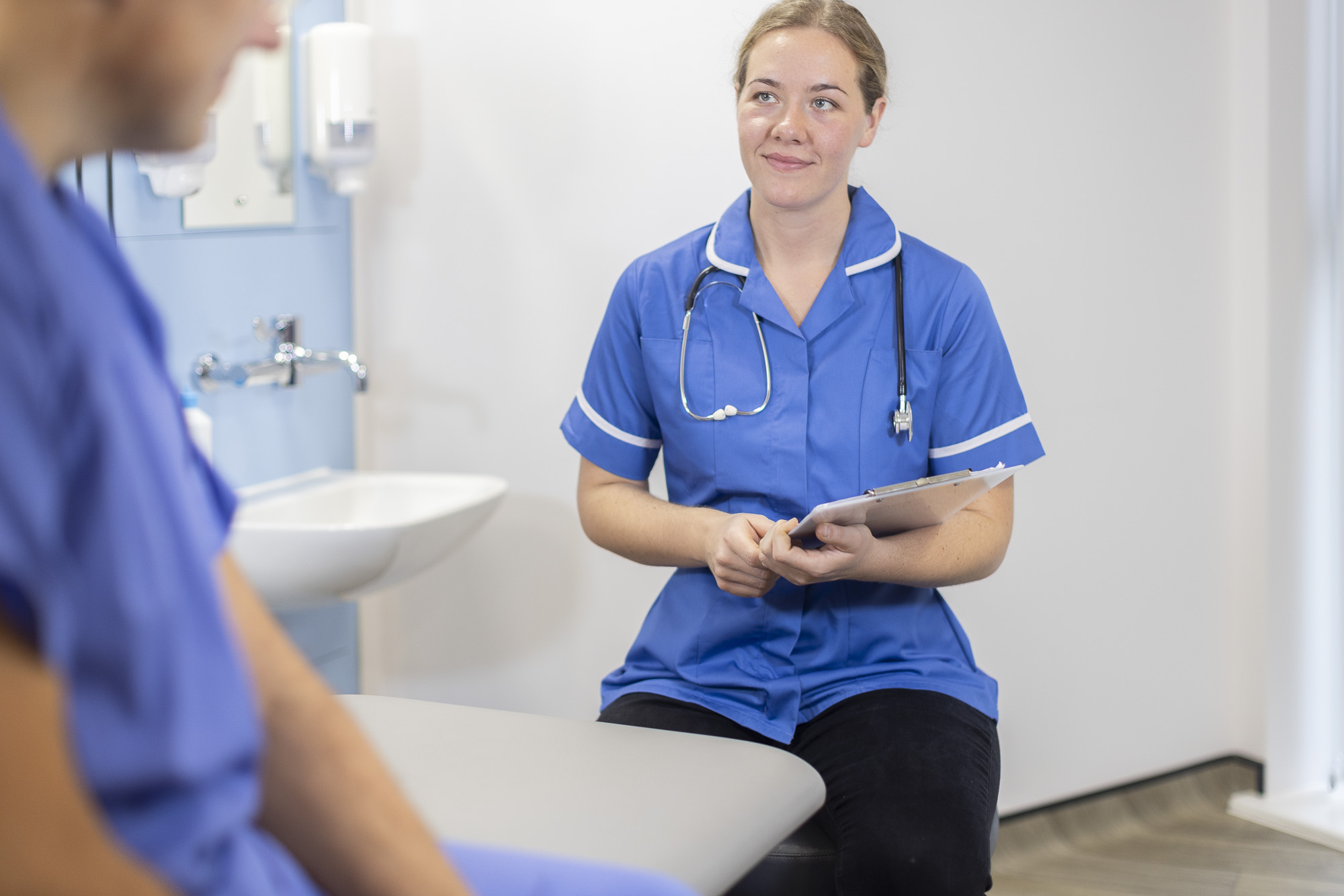 Two nurses talking