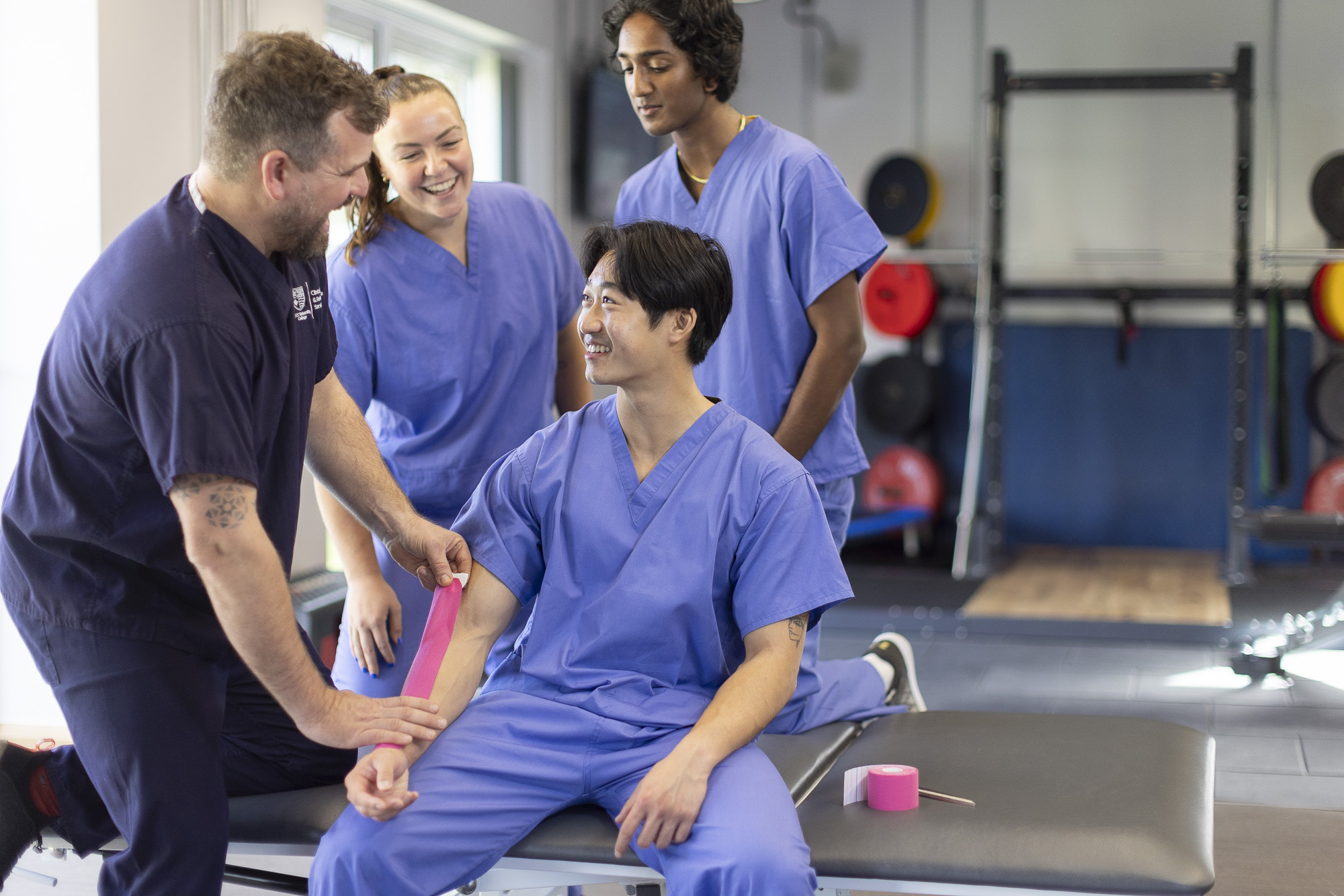 Chiropractic teacher and students in IRC