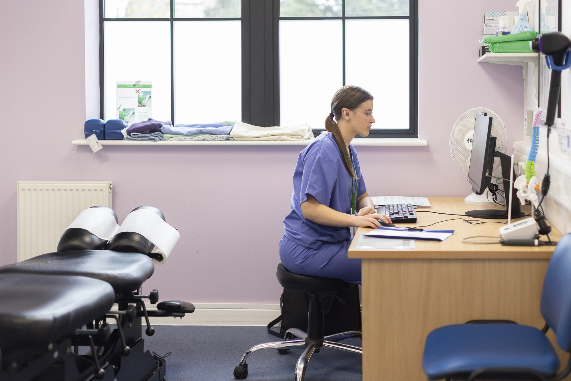 Student in the Chiropractic clinic on a computer