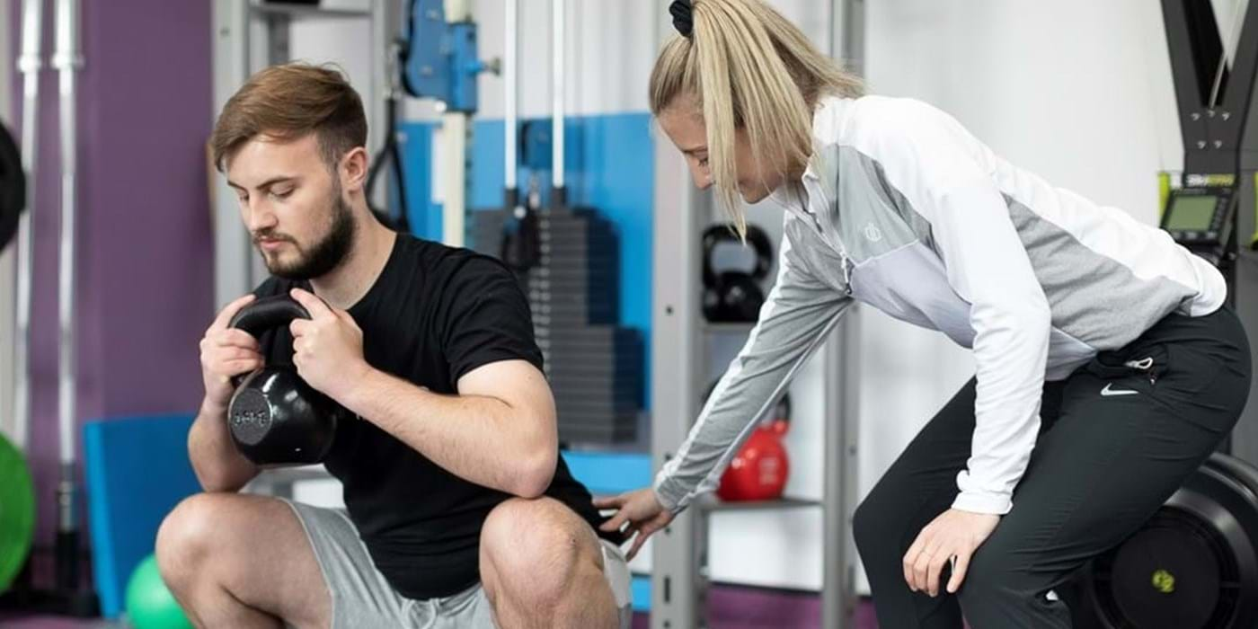 Billy Coleman doing a Squat