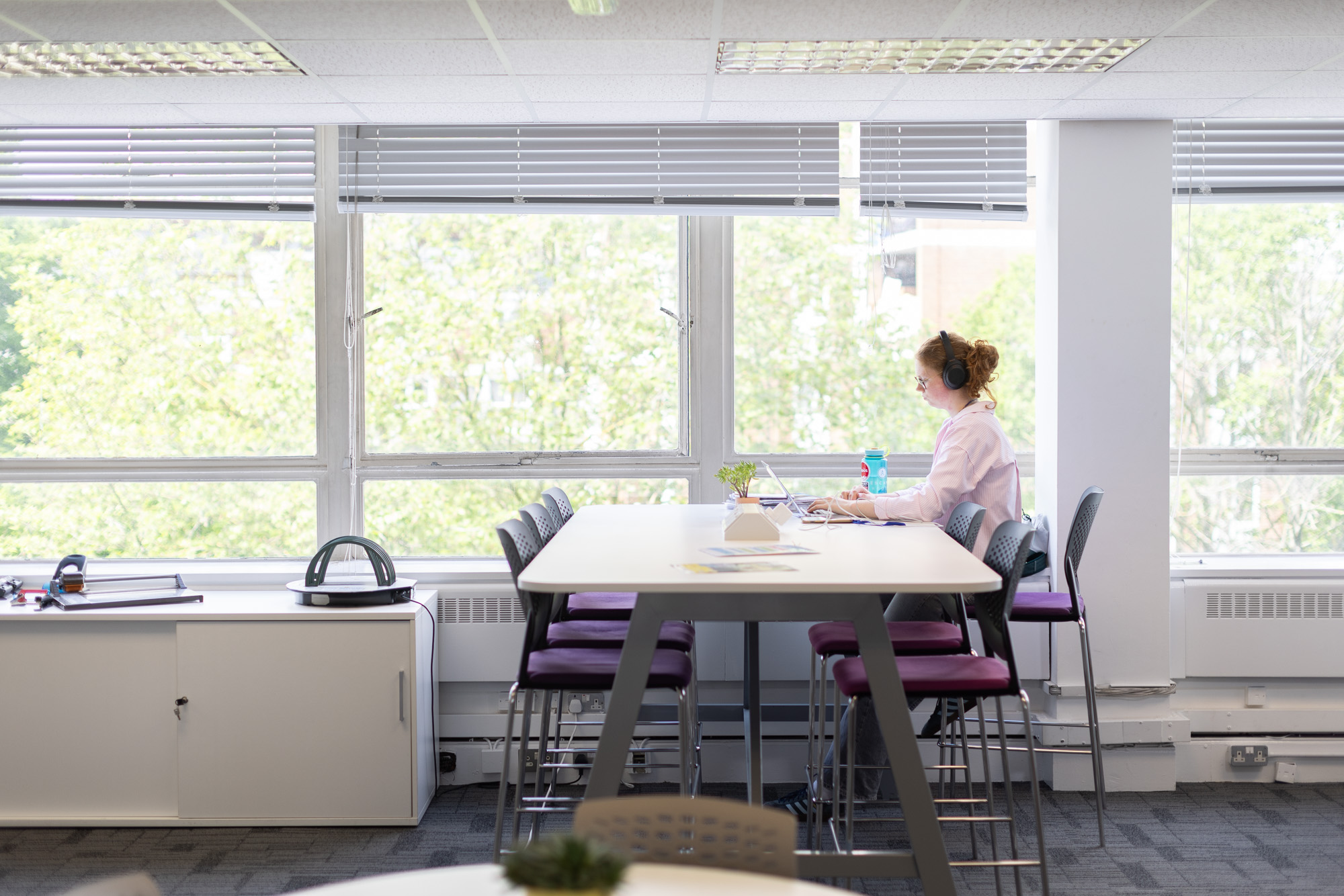 Student in London campus library