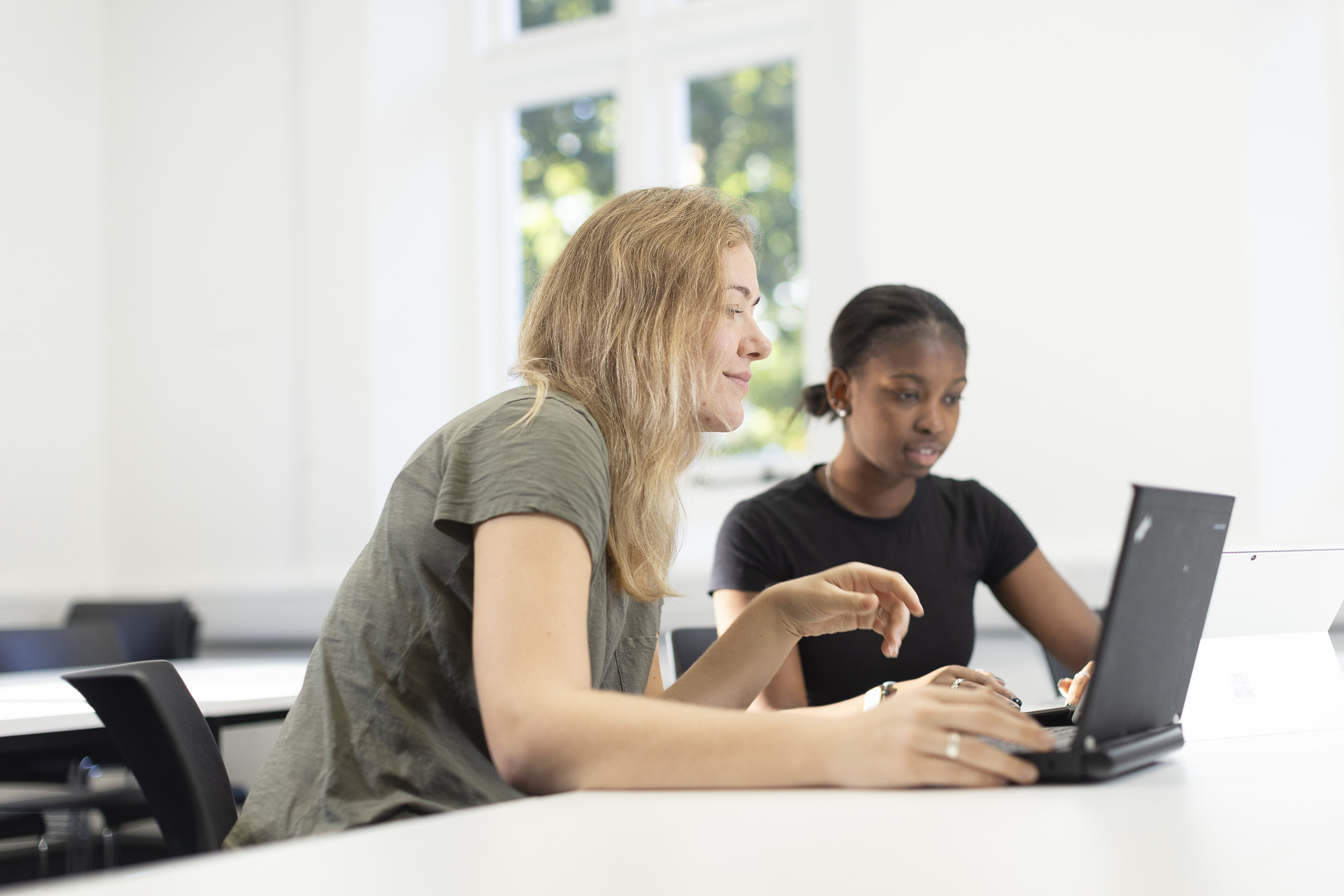 Two students doing work together