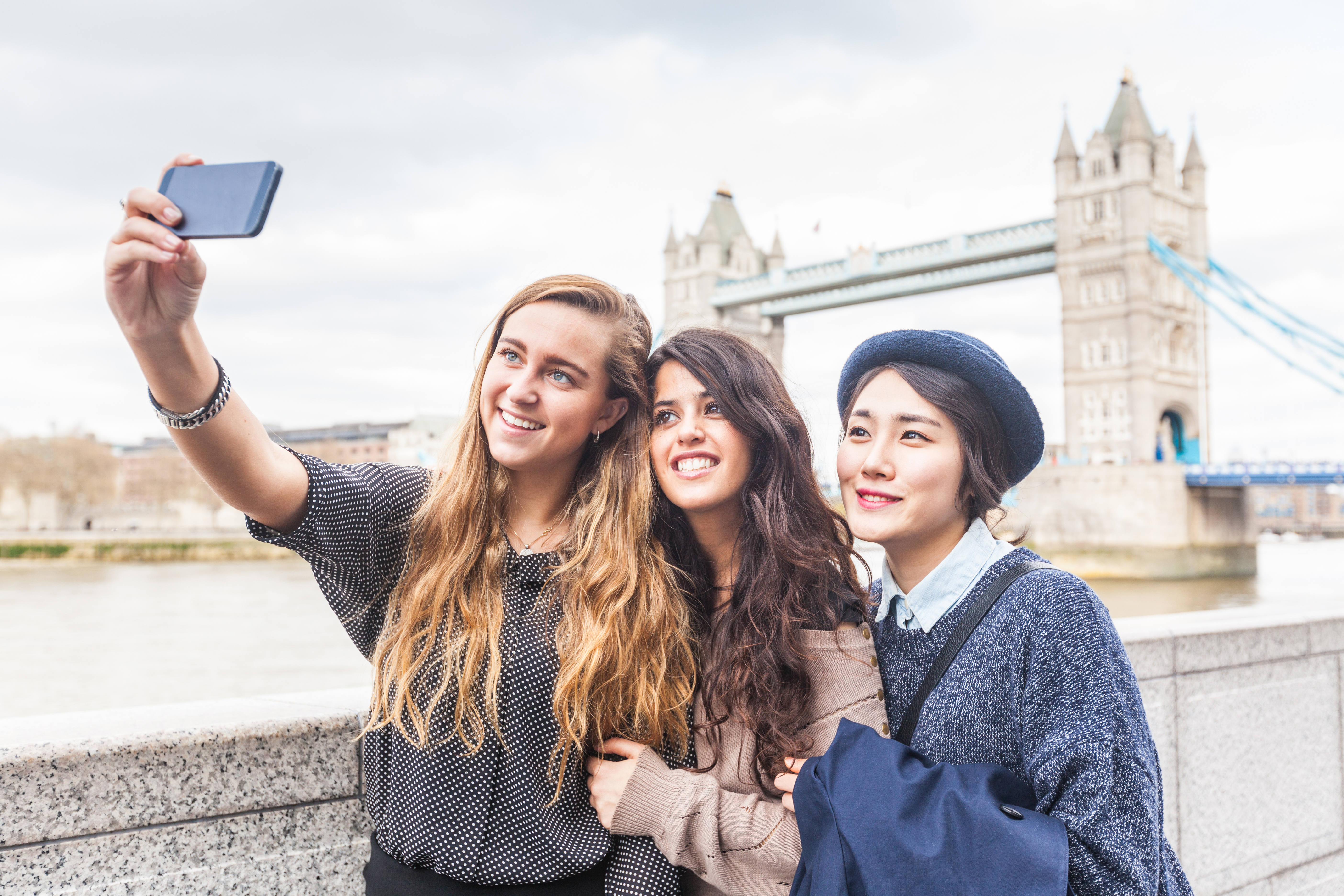 Students take a selfie by Tower Bridge